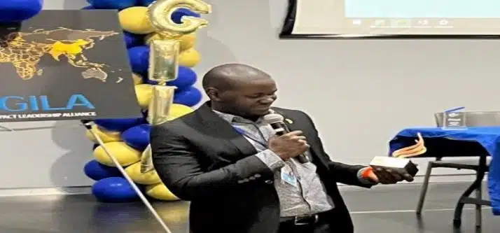 Andrew Ojok Oulanyah recieves the Legacy Torch